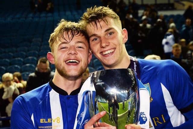 Liam Waldock and Liam Shaw celebrate after winning the PDL2 National Play-Off Final at Hillsborough