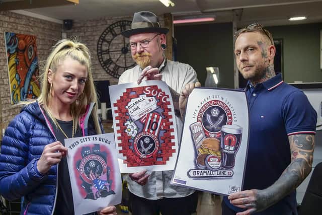 Ben Smalley, who owns Skin Candii tattoo parlour in Woodhouse, has seen a big increase in demand for Sheffield United tattoos since the club were promoted to the Premier League. He's pictured with Jodie Cherry and Al Richardson (pic: Scott Merrylees)