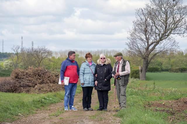 Dave Glover with Councillor Robert Reid and local residents Sharon Gibson and Angela Roberts at the site near Old Edlington where a Lancaster bomber reportedly crashed in 1943, killing all seven crew members