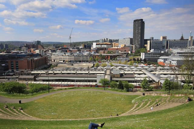 Enjoying the sun looking over Sheffield City Centre. Picture: Chris Etchells