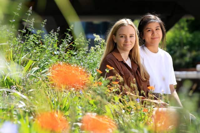 University of Sheffield students Cindy To and Katie Wright, whose garden border design for Chatsworth Flower Show was inspired by the story of schoolgirls who were evacuated to the house during the war
