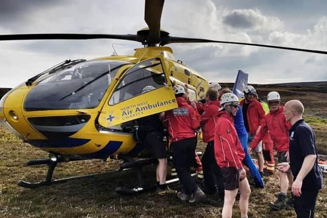 A woman was airlifted to the Northern General Hospital in Sheffield after she was helped by mountain rescue team volunteers (Pic: Woodhead Mountain Rescue Team)