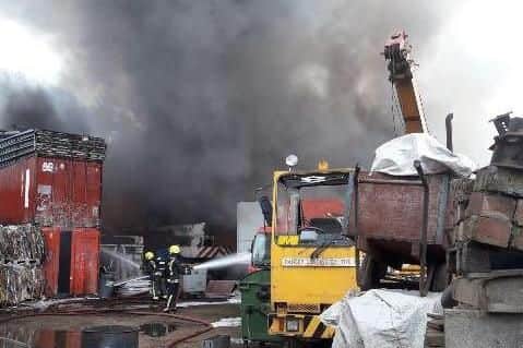 Firefighters continue to tackle a blaze at a Barnsley scrapyard this morning
