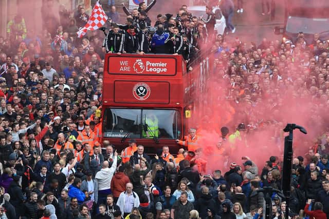 The Sheffield United players and management celebrate promotion: Danny Lawson/PA Wire.