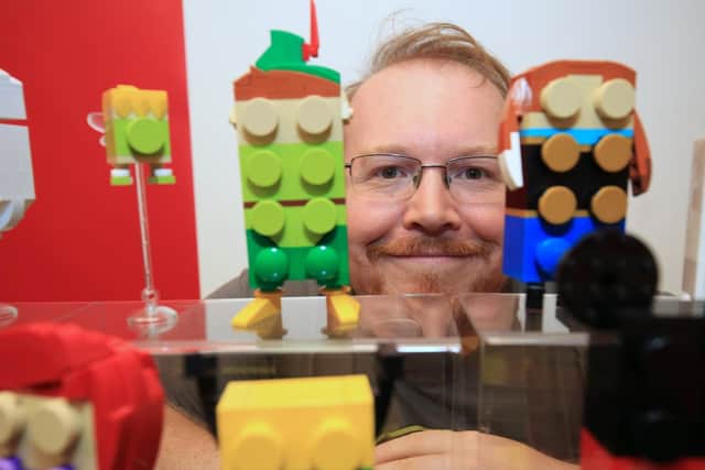 Sheffield Bricktropolis Fringe, which is part of Sheffield Bricktropolis AFOL (Adult Fans of LEGO) display at the Interactive Building Zone. Pictured is Chris Adams with his models.