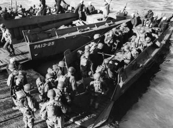 US troops board boats on the English coast ahead of the Normandy landings (pic: Keystone/Getty Images).