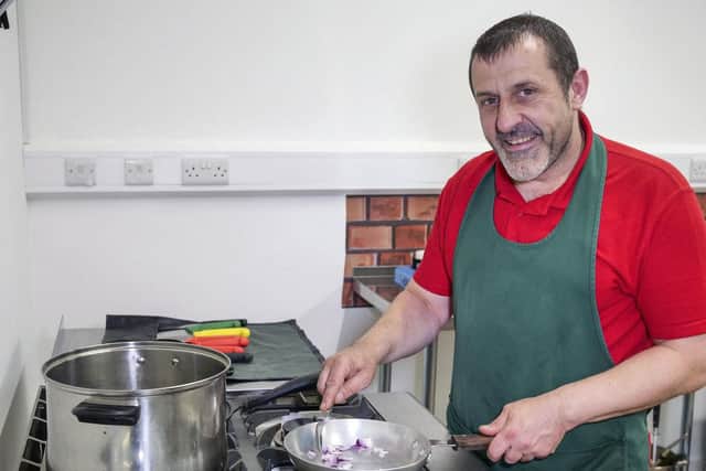 Ex teacher Carl Brown has started a business teaching people how to cook restaurant standard curry.  Picture Scott Merrylees
