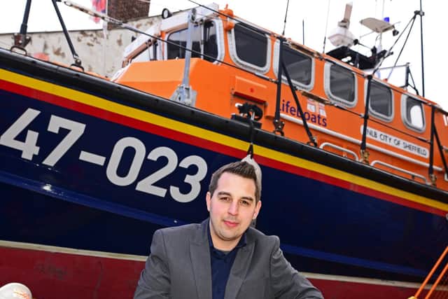 CEO Matthew Wakefield, pictured by a 47ft RNLI lifeboat