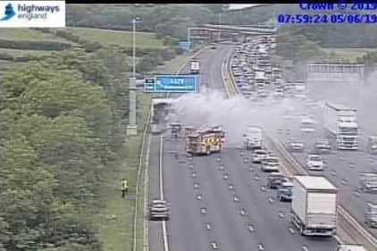 Firefighters have extinguished a coach fire on the M1 near to Meadowhall
