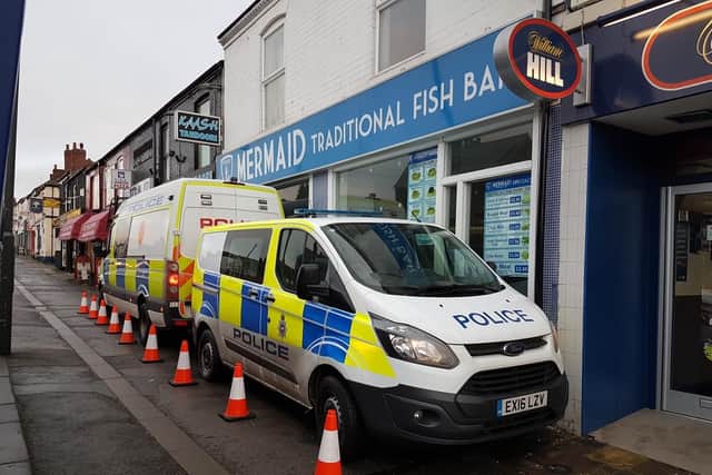 Police pictured outside Mermaid Fish Bar on Sheffield Road, Chesterfield, in December 2017.