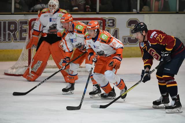Cole Shudra and Davey Phillips guard the net at Guildford