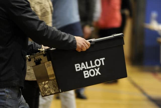 A ballot box being taken to count