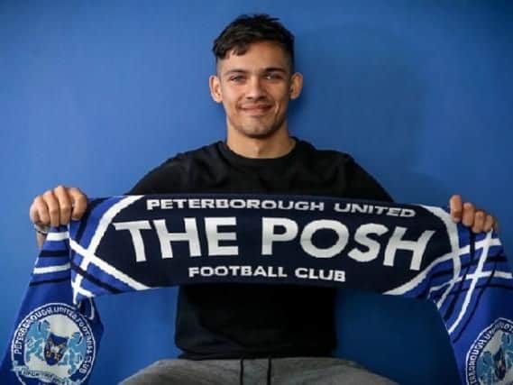 Niall Mason has signed for Peterborough United.