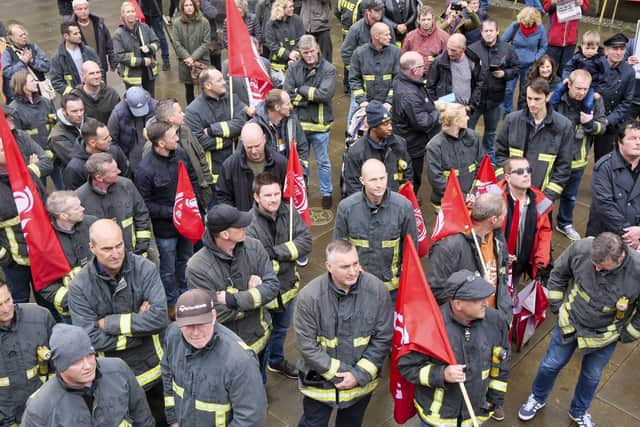 Firefighters rally outside Sheffield Town Hall. Picture Scott Merrylees