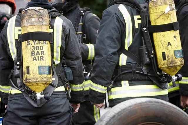 A woman has been rescued from a ground floor flat fire in Rawmarsh this morning