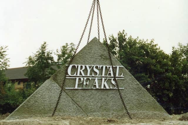 The Crystal Peaks Shopping Centre sign is put in place