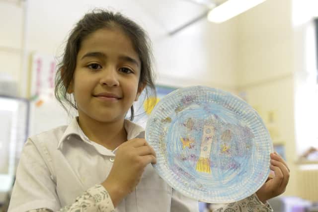 Fatima shows off her Moon Plate