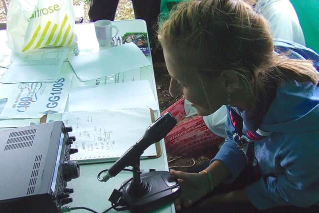 In 2010, some of of the group set up a shortwave radio station at the Ringinglow Guide Camp in western Sheffield. This girl was able to speak with a Russian amateur radio operator and let him know what it was like to be in the UK for the International Guide Camp.
