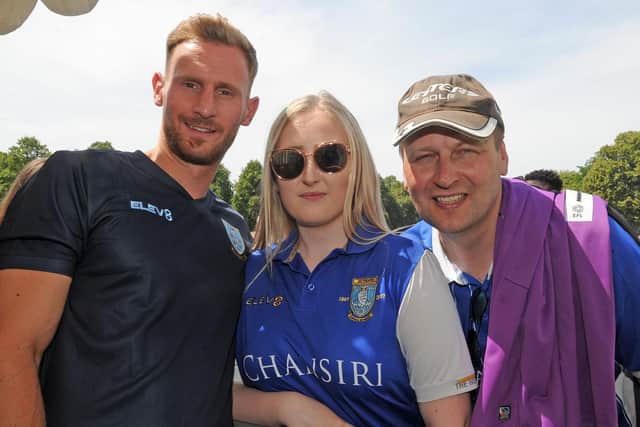 Owls captain Tom Lees with Alysia and Bernard Goodall at the 2018 Owls in the Park