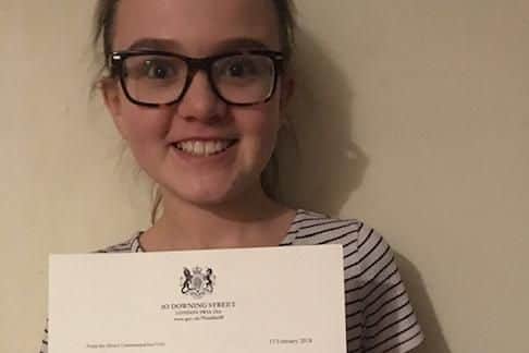 Millie with her letter to PM Theresa May
