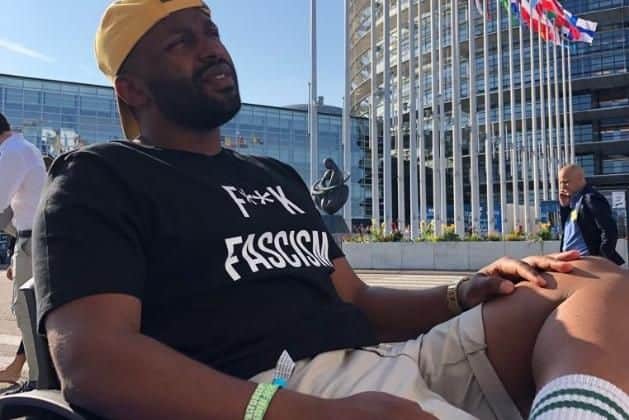 Magid wore a baseball cap and t-shirt which read 'f*** facism' (Picture: @MagicMagid)