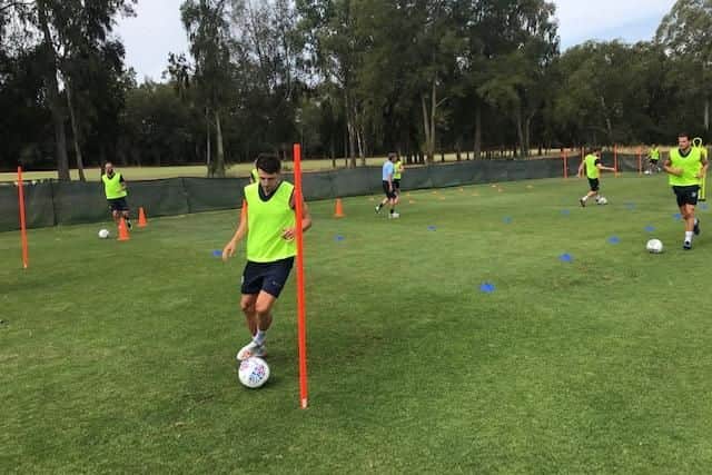 Penney working on his dribbling skills in Portugal