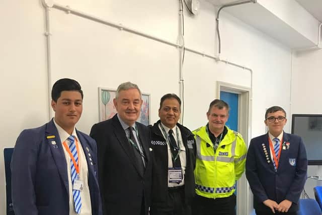 Head Student Nabeel Ahmed, Year 11, with South Yorkshire Police INSPIRING Youth Awards police officers, and Charlie Ward, with Andrew Coombe.