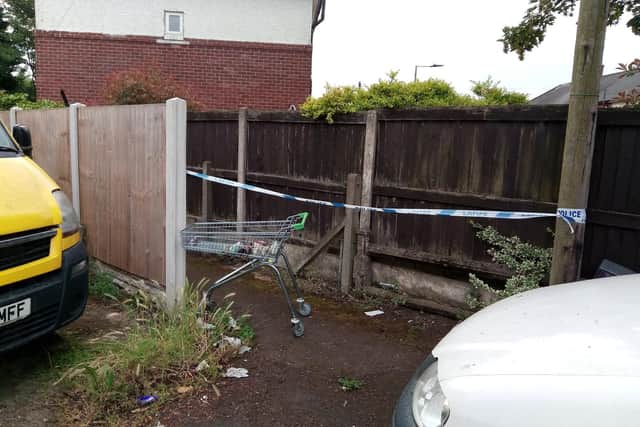An alleyway is sealed off after a shooting on Chequer Avenue, Hyde Park, last night