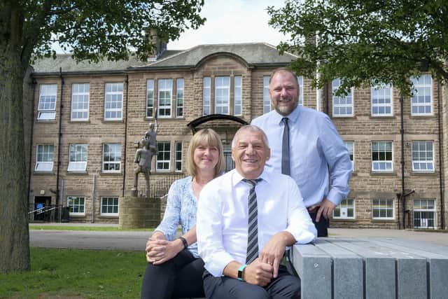 Kay Brentall and Pete Ellin pictured with Headteacher Richard Walkden