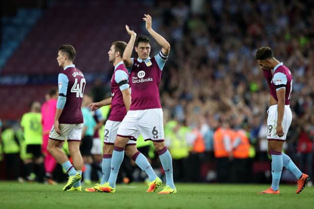 Aston Villa's Tommy Elphick applauds the fans after the Sky Bet Championship match at Villa Park, Birmingham. PRESS ASSOCIATION Photo. Picture date: Tuesday August 16, 2016. See PA story SOCCER Villa. Photo credit should read: Nick Potts/PA Wire. RESTRICTIONS: EDITORIAL USE ONLY No use with unauthorised audio, video, data, fixture lists, club/league logos or "live" services. Online in-match use limited to 75 images, no video emulation. No use in betting, games or single club/league/player publications.