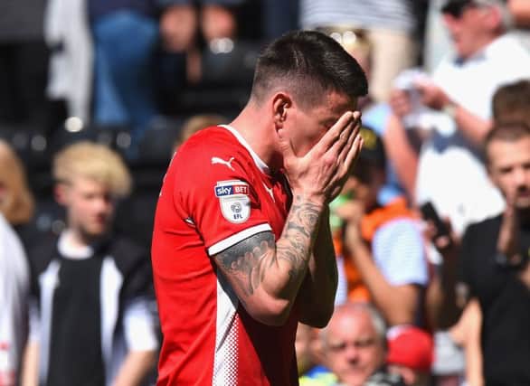 DERBY, ENGLAND - MAY 06:  Adam Hammill of Barnsley reacts as Barnsley are relegated during the Sky Bet Championship match between Derby County and Barnsley at iPro Stadium on May 6, 2018 in Derby, England.  (Photo by Tony Marshall/Getty Images)