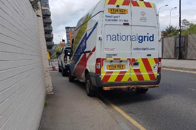 Van parked on yellow lines near The Harlequin pub, June 2017
