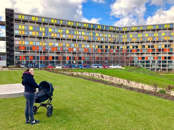 Jen Harris with seven-week-old Elsie outside Park Hill flats in Sheffield (Photo: Rob Harris).