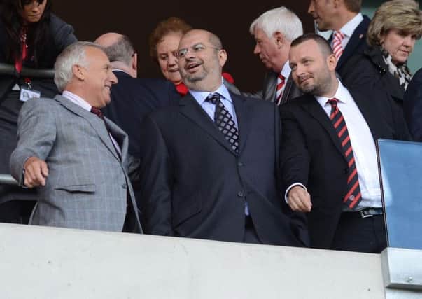 Sheffield United owners Kevin McCabe and Prince Abdullah bin Mosaad bin Abulaziz Al Saud and Selahattin Baki (right)