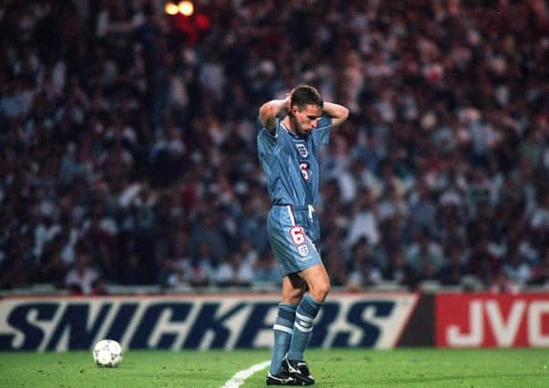 Flashback: Gareth Southgate holds his head in disbelief after missing the crucial penalty against Germany in the Euro 96 semi-final. Pic: PA.