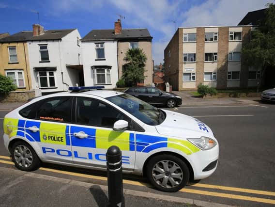 Police on Wostenholm Road, Nether Edge, where a house was shot at. Picture: Chris Etchells.
