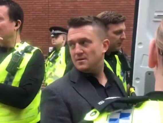Tommy Robinson being arrested outside of Leeds Crown Court.