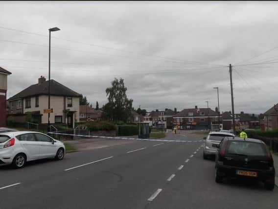 A large police cordon remains in place in Woodthorpe this morning