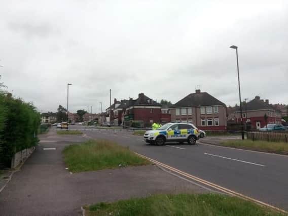 Police officers remain in Woodthorpe this morning after a shooting last night