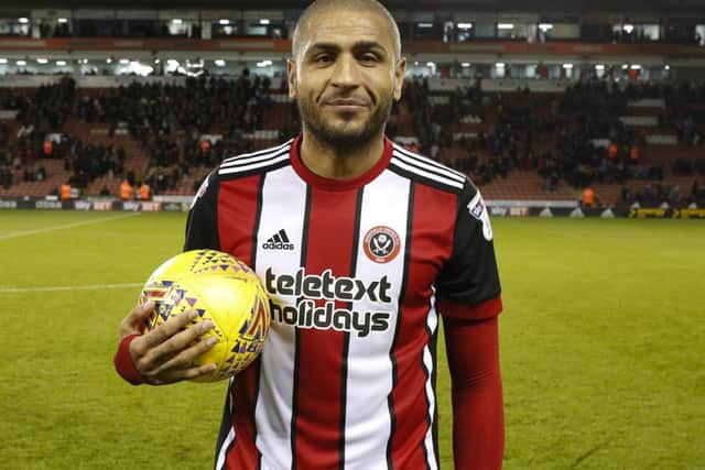 Leon Clarke collected the match ball after scoring four times against Hull City at Bramall Lane last season: Simon Bellis/Sportimage