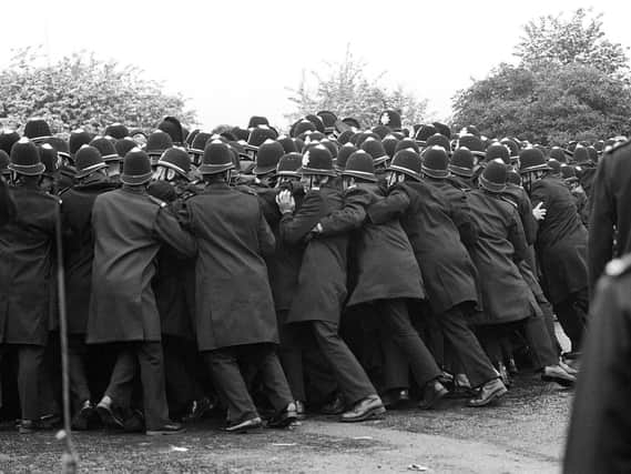 01/06/1984 of police officers pushing against striking miners outside the Orgreave Coking Plant near Rotherham. 
Photo: PA Wire