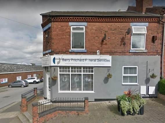 Hanging baskets were stolen from outside a funeral home in Killamarsh