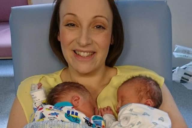 Laura with her twin babies.