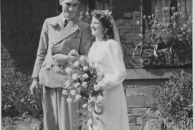 Betty and her husband Lawrence on their wedding day at St John's Church in Ranmoor, 12th April 1948