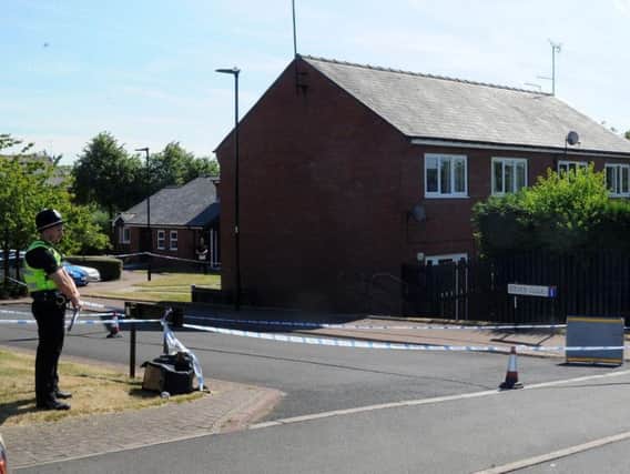 A police cordon remains in place around the house where a man was stabbed to death in Sheffield this week