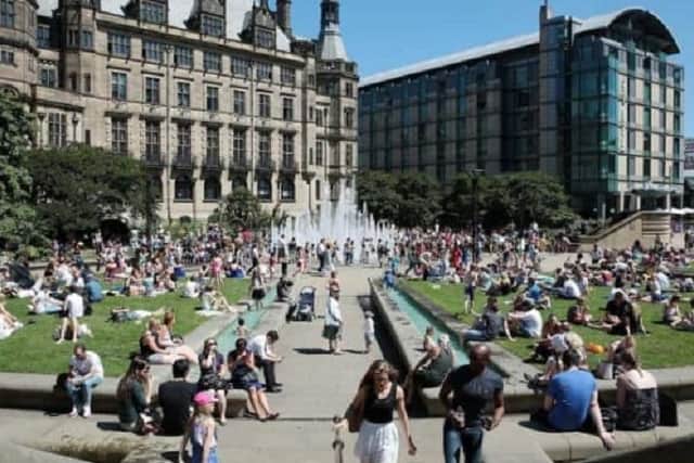 People enjoying the sun in Sheffield.