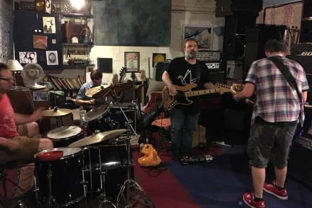 The Clench in rehearsal for their final show.
