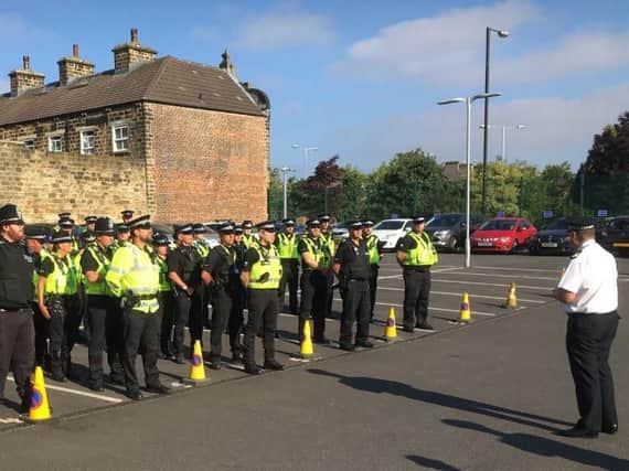 Police officers were briefed ahead of a day of action in Barnsley yesterday