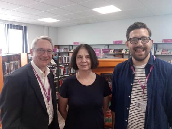 Nick Partridge, libraries, archives and information manager; Councillor Mary Lea, cabinet member for culture, parks and leisure; and Alex Holyoake, library and information officer, at Woodseats library