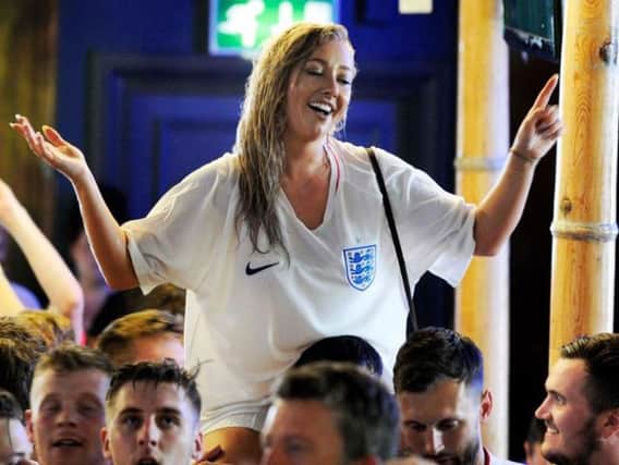 England fans in the Walkabout bar celebrating Saturday's win over Sweden. Picture: Steve Ellis